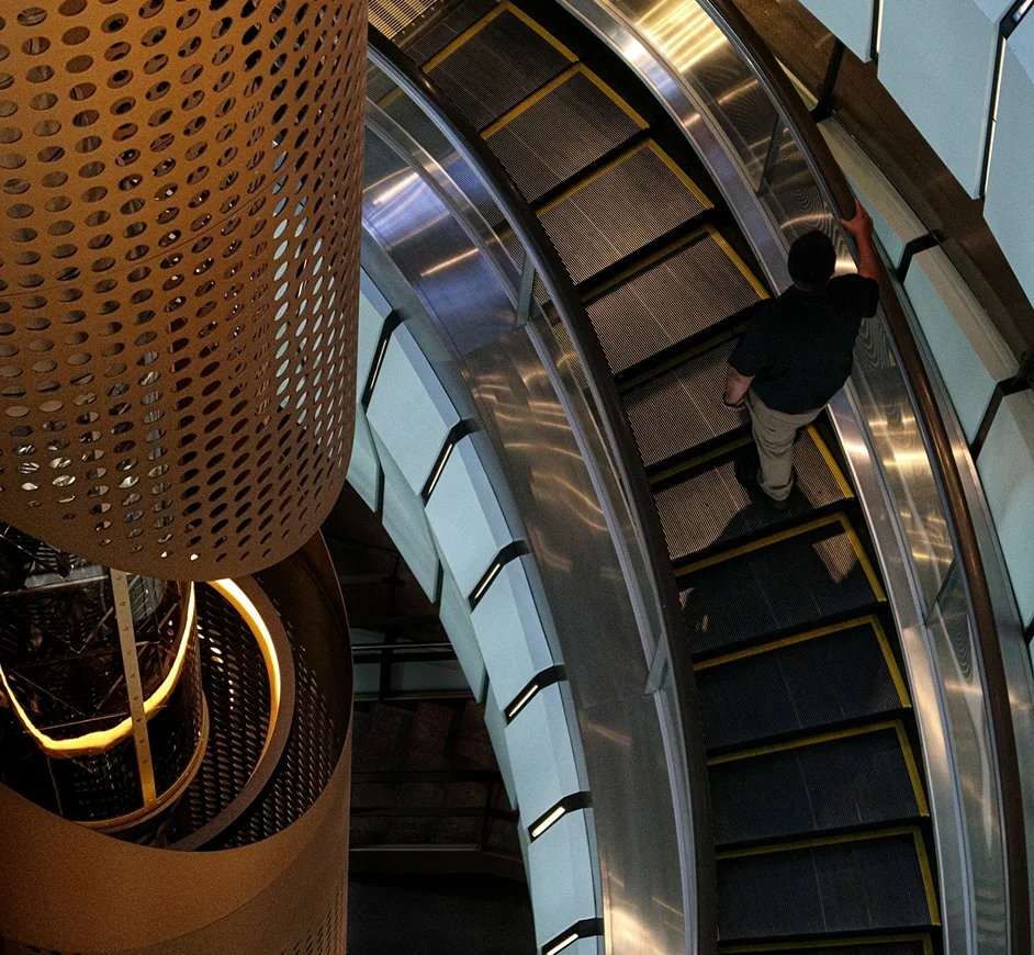 Spiral escalators